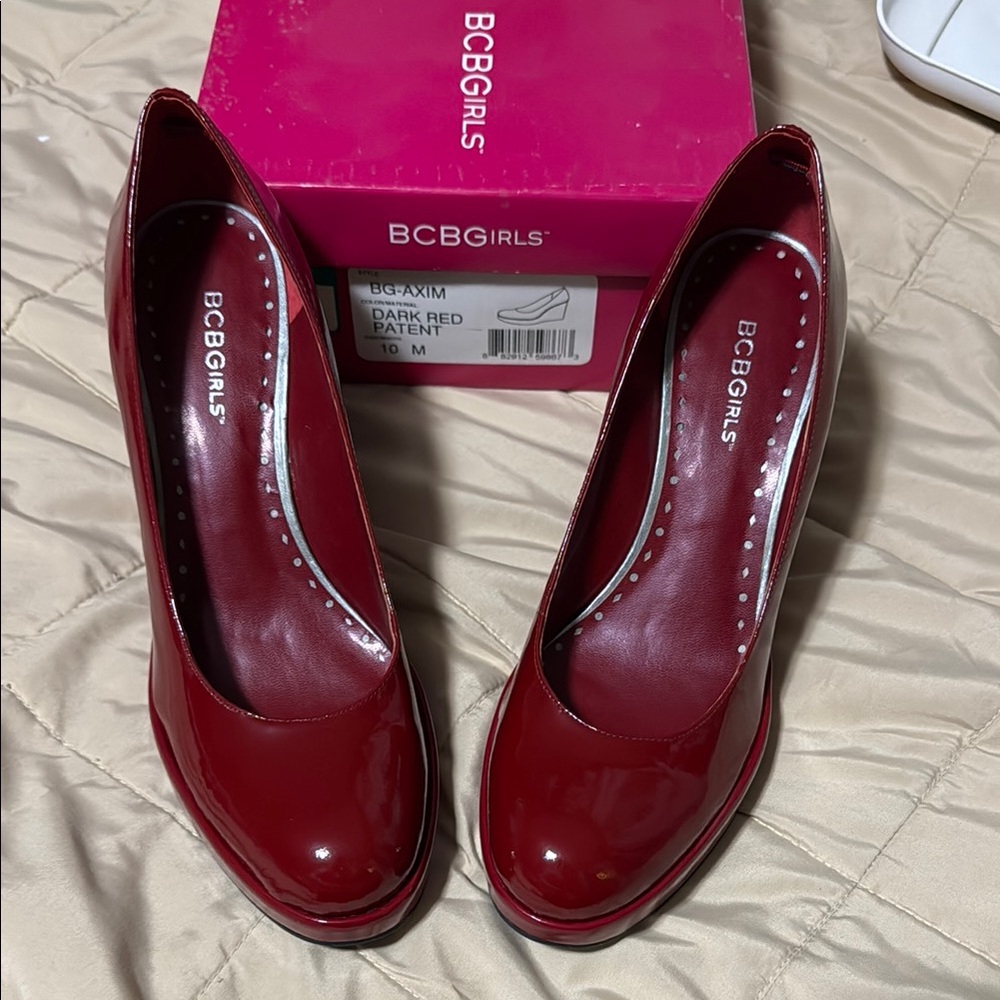 Vintage, unworn BCBGirls Women's Axum Dark Red Patent Platform Heels